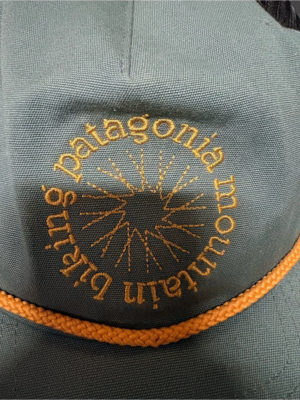 Patagonia Men’s Teal  & Black Trucker Hat with Yellow Accent